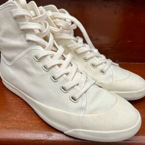 Canvas off white colored sneaker.